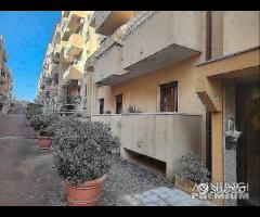 APPARTAMENTO con box auto di mq.30