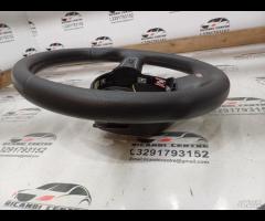 VOLANTE SPORTIVO MULTIFUNZIONE IN PELLE TRAFORATA - 15