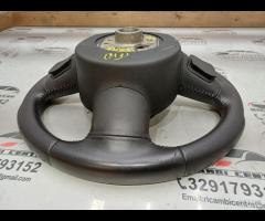 VOLANTE SPORTIVO MULTIFUNZIONE IN PELLE TRAFORATA - 22