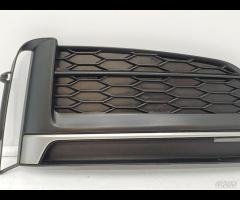 MASCHERINA FENDINEBBIA PARAURTI ANTERIORE DX AUDI