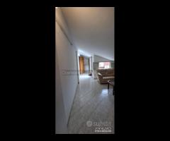 Luminosa mansarda con posto auto a Riposto