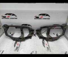 SUPPORTO FARO ANTERIORE SX/DX MITSUBISHI COLT MN10