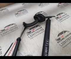 PISTONE PORTELLONE POSTERIORE DX+SUPPORTO 2010 MER