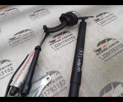 PISTONE PORTELLONE POSTERIORE DX+SUPPORTO 2010 MER