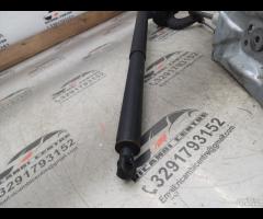 PISTONE PORTELLONE POSTERIORE DX+SUPPORTO 2010 MER - 22