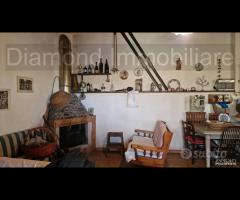 Casa di campagna con terreno a Rovittello